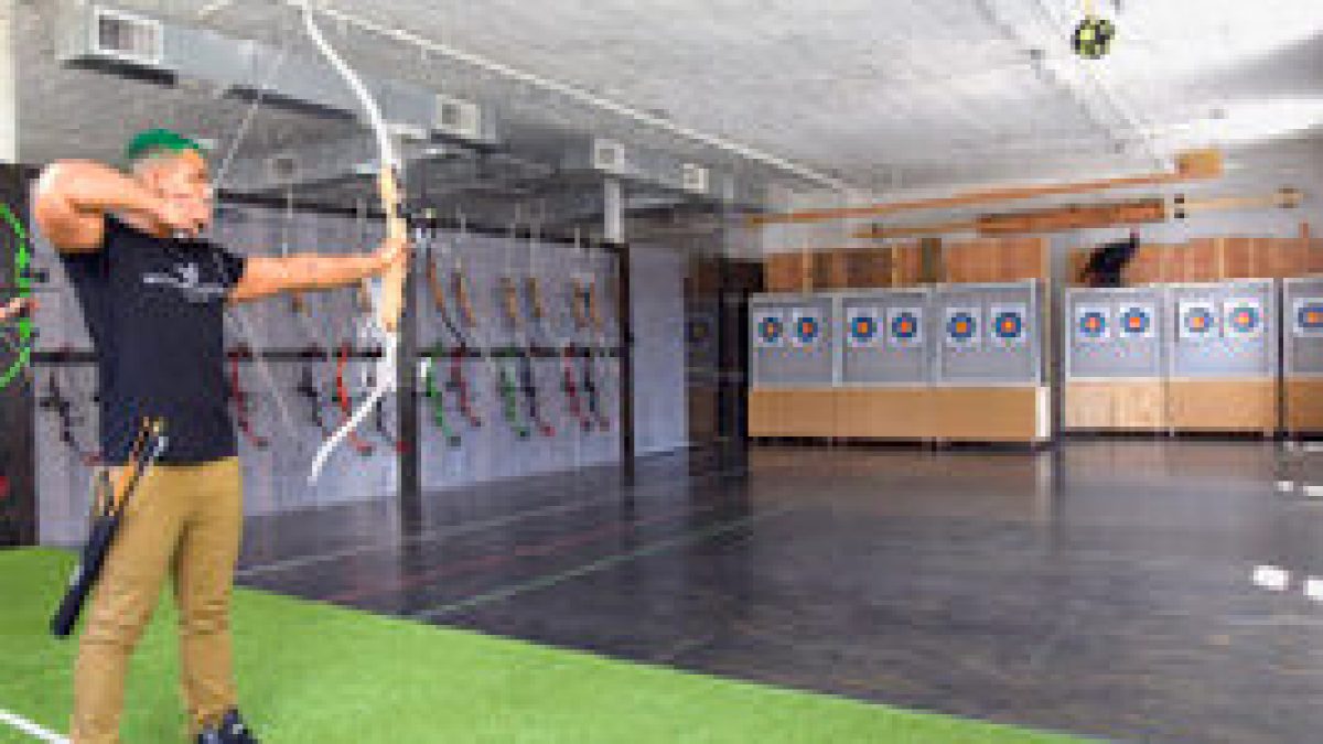 a group of people playing a game on the court