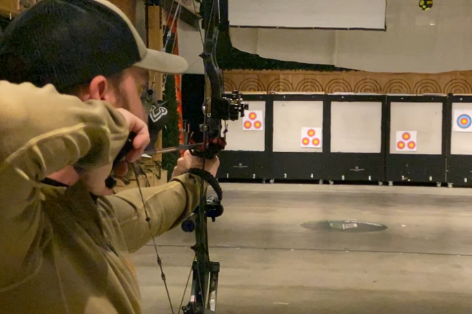 a man holding a gun